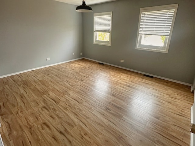 620 Teton Cir, Carol Stream, IL 60188 - spare room featuring wood finished floors and baseboards