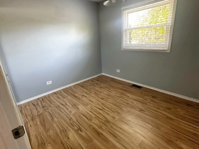 620 Teton Cir, Carol Stream, IL 60188 - spare room with wood finished floors and baseboards