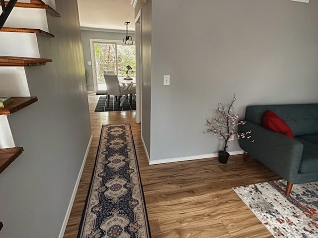 620 Teton Cir, Carol Stream, IL 60188 - corridor featuring wood finished floors, baseboards, and crown molding