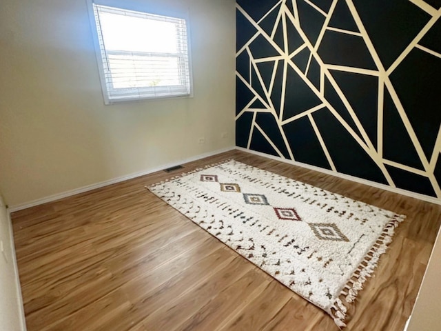 620 Teton Cir, Carol Stream, IL 60188 - unfurnished room featuring wood finished floors and baseboards