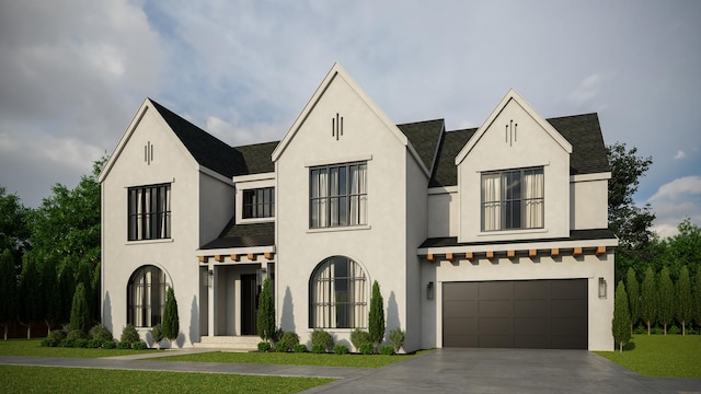 4300 Franklin Ave, Western Springs, IL 60558 - view of front facade featuring stucco siding, a garage, and concrete driveway