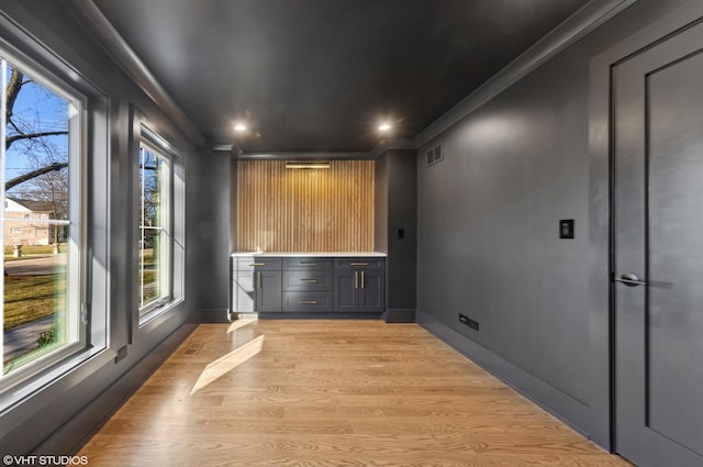 4300 Franklin Ave, Western Springs, IL 60558 - bar area with ornamental molding, healthy amount of natural light, recessed lighting, light wood-style floors, and baseboards