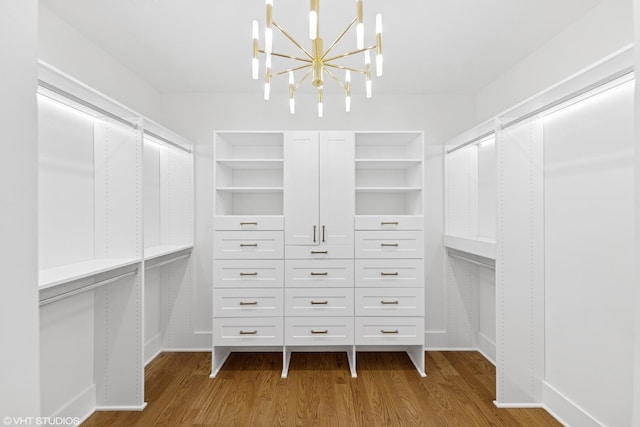 4300 Franklin Ave, Western Springs, IL 60558 - walk in closet with wood finished floors and a chandelier