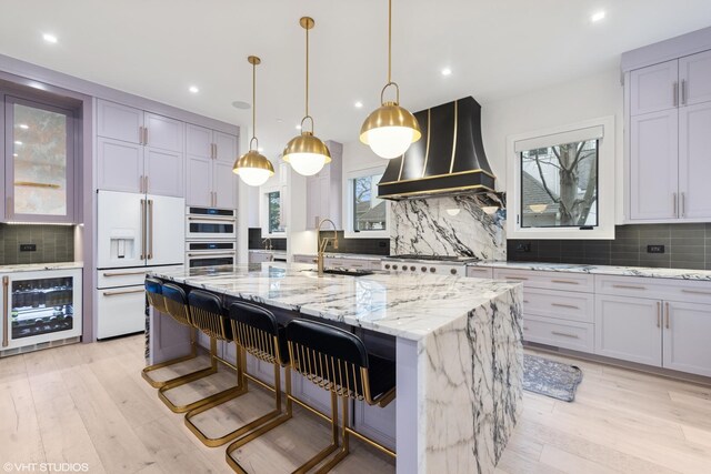 4300 Franklin Ave, Western Springs, IL 60558 - kitchen with white appliances, beverage cooler, premium range hood, decorative backsplash, and recessed lighting