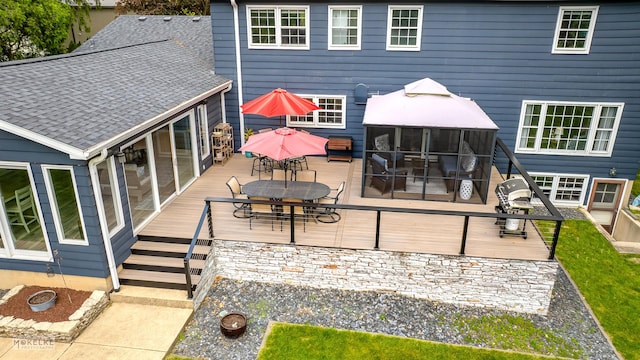 7500 US Highway 34, Oswego, IL 60543 - back of property with outdoor dining area and a deck