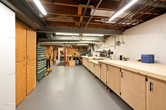 7500 US Highway 34, Oswego, IL 60543 - basement featuring a workshop area