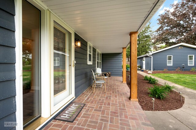 7500 US Highway 34, Oswego, IL 60543 - view of patio / terrace featuring covered porch