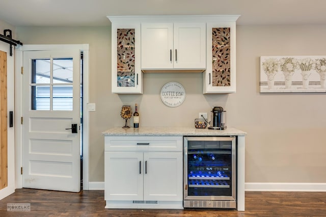 7500 US Highway 34, Oswego, IL 60543 - indoor dry bar with wine cooler, dark wood-style floors, baseboards, and a barn door