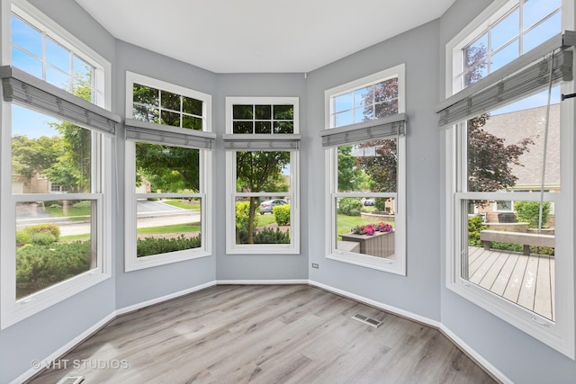 10428 Morningside Ct, Orland Park, IL 60462 - unfurnished sunroom featuring wood finished floors and baseboards