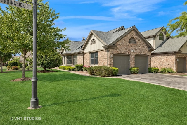 10428 Morningside Ct, Orland Park, IL 60462 - view of front facade with an attached garage, brick siding, driveway, a front lawn, and a shingled roof