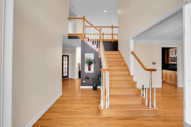 39W027 Dean St, Saint Charles, IL 60175 - stairs featuring wood finished floors, baseboards, ornamental molding, recessed lighting, and a towering ceiling