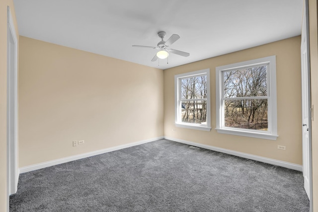 39W027 Dean St, Saint Charles, IL 60175 - unfurnished room with baseboards, carpet, and a ceiling fan