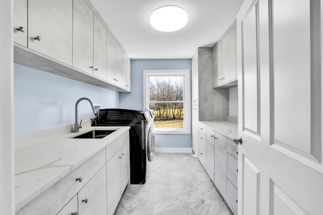 39W027 Dean St, Saint Charles, IL 60175 - laundry room with cabinet space, independent washer and dryer, light marble finish floors, and baseboards