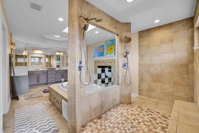 39W027 Dean St, Saint Charles, IL 60175 - bathroom featuring tile patterned floors, a walk in shower, vanity, recessed lighting, and tile walls