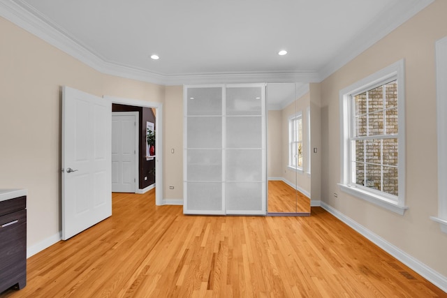 39W027 Dean St, Saint Charles, IL 60175 - unfurnished bedroom featuring ornamental molding, light wood-style flooring, baseboards, and recessed lighting