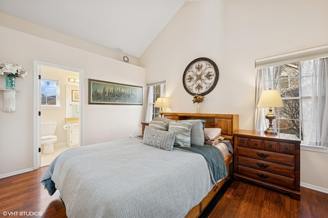 bedroom with multiple windows, high vaulted ceiling, dark wood-type flooring, and baseboards