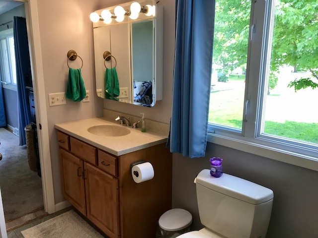 116 N Beech St, Princeton, IL 61356 - half bath featuring toilet and vanity
