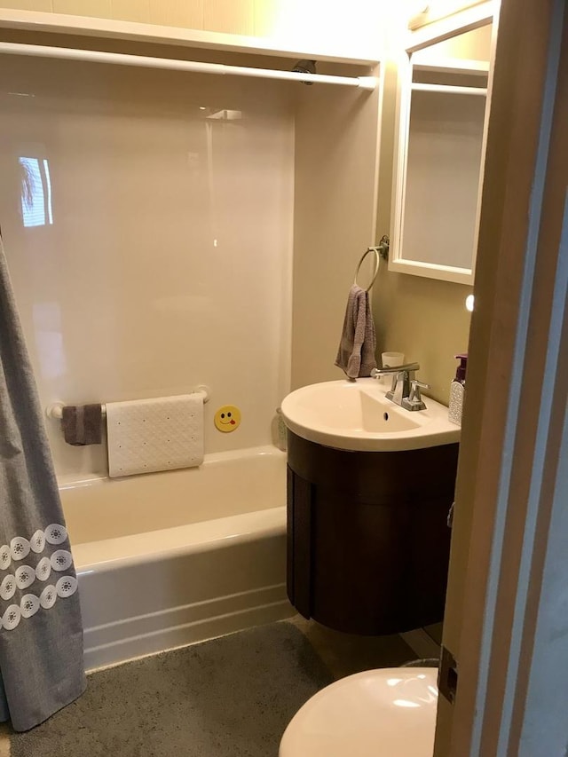 116 N Beech St, Princeton, IL 61356 - bathroom featuring vanity and shower / bath combo with shower curtain