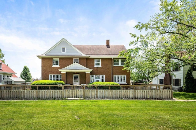 546 Elmwood Ct, El Paso, IL 61738 - view of front of home featuring a chimney and brick siding