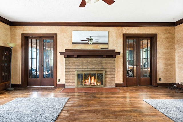 546 Elmwood Ct, El Paso, IL 61738 - unfurnished living room featuring french doors, a ceiling fan, healthy amount of natural light, and ornamental molding