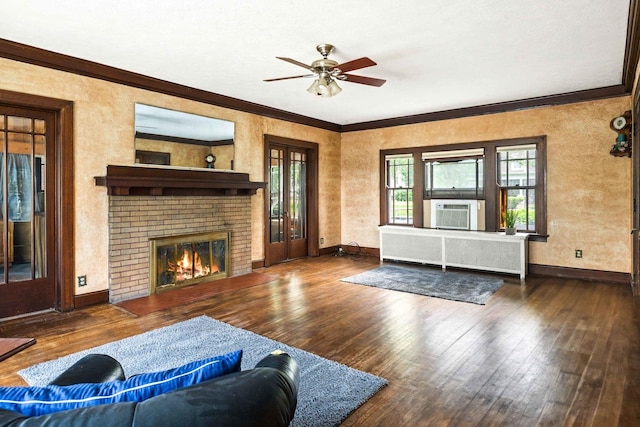 546 Elmwood Ct, El Paso, IL 61738 - living room featuring wood-type flooring, ceiling fan, radiator, cooling unit, and ornamental molding