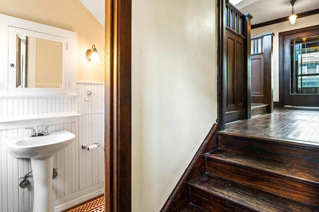 546 Elmwood Ct, El Paso, IL 61738 - stairs with a wainscoted wall and ornamental molding