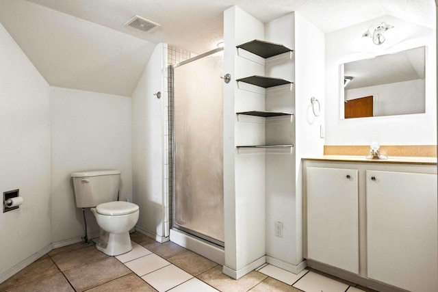 546 Elmwood Ct, El Paso, IL 61738 - bathroom with a stall shower, toilet, vaulted ceiling, vanity, and tile patterned flooring