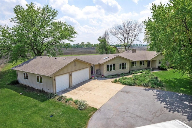 45W251 Ic Trl, Maple Park, IL 60151 - single story home with an attached garage, concrete driveway, a front yard, and roof with shingles