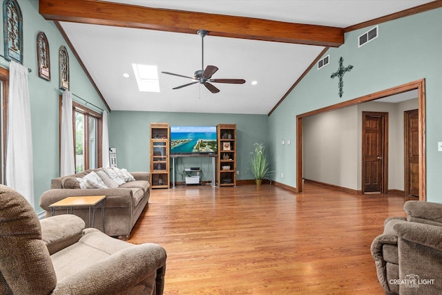 45W251 Ic Trl, Maple Park, IL 60151 - living room with ceiling fan, a skylight, beamed ceiling, light wood-style flooring, and baseboards