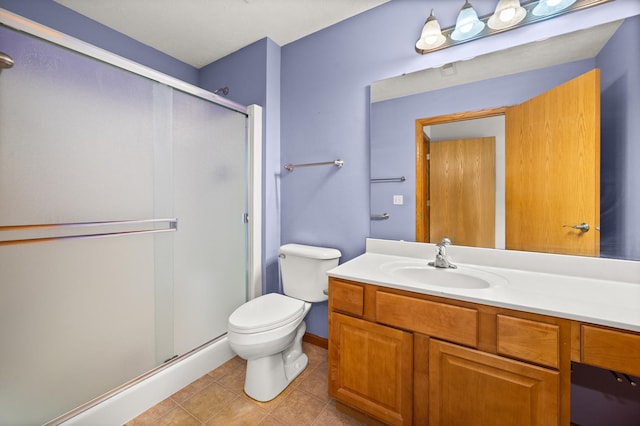 full bath featuring toilet, a stall shower, vanity, and tile patterned flooring