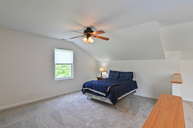 14445 W Walden Ln, Wadsworth, IL 60083 - carpeted bedroom with vaulted ceiling, baseboards, and a ceiling fan
