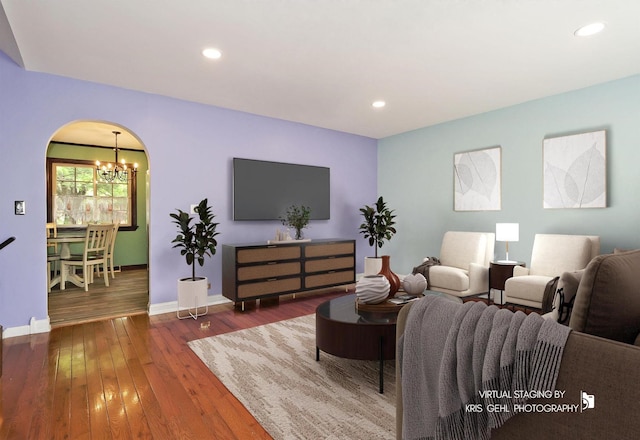 2810 Brentwood Ln, Mchenry, IL 60050 - living area with a chandelier, wood-type flooring, baseboards, arched walkways, and recessed lighting