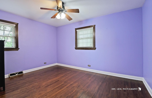 2810 Brentwood Ln, Mchenry, IL 60050 - spare room featuring dark wood-style flooring, baseboards, and ceiling fan