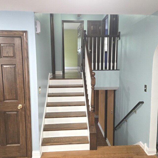 2810 Brentwood Ln, Mchenry, IL 60050 - staircase featuring baseboards