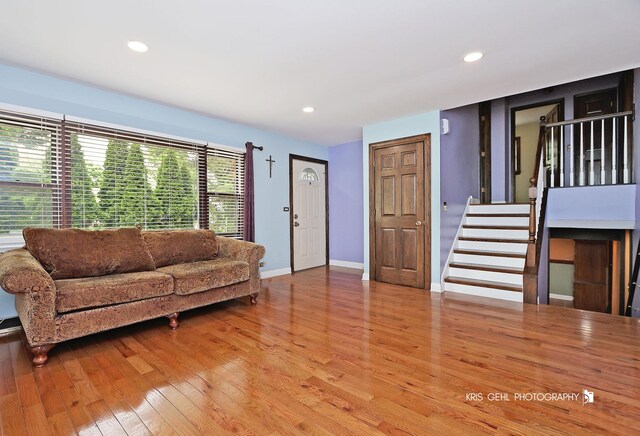 2810 Brentwood Ln, Mchenry, IL 60050 - living room featuring light wood-style floors, stairs, and recessed lighting
