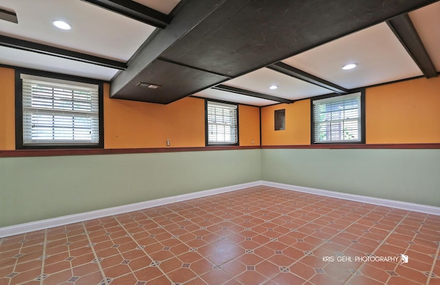 2810 Brentwood Ln, Mchenry, IL 60050 - spare room featuring beamed ceiling, healthy amount of natural light, baseboards, recessed lighting, and tile patterned floors