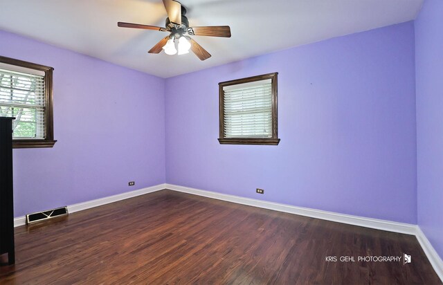 2810 Brentwood Ln, Mchenry, IL 60050 - spare room featuring dark wood-style floors and a ceiling fan