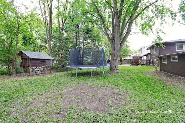2810 Brentwood Ln, Mchenry, IL 60050 - view of green lawn with a trampoline