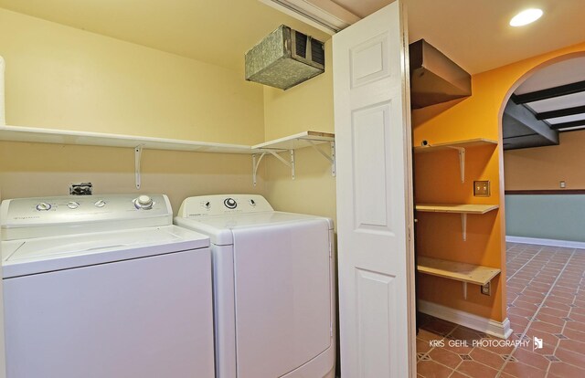 2810 Brentwood Ln, Mchenry, IL 60050 - laundry area with dark tile patterned flooring and separate washer and dryer