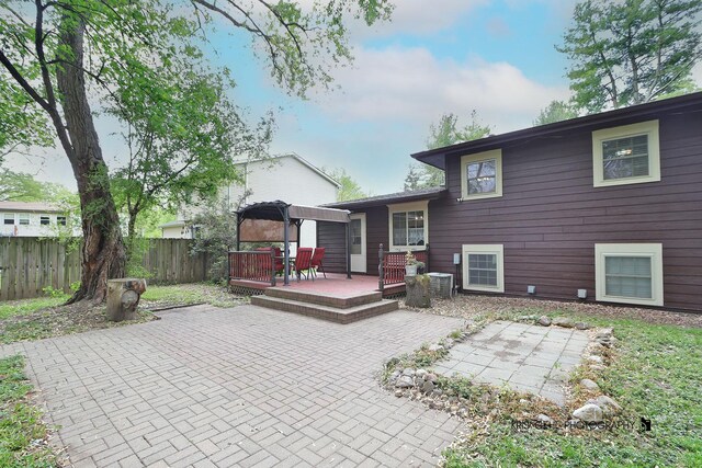2810 Brentwood Ln, Mchenry, IL 60050 - back of house with a patio area and a wooden deck