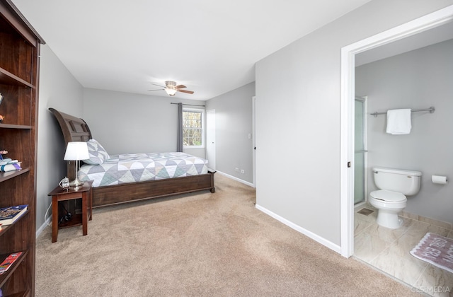 658 Cutter Ln, Elk Grove Village, IL 60007 - bedroom featuring carpet, baseboards, ensuite bath, and a ceiling fan