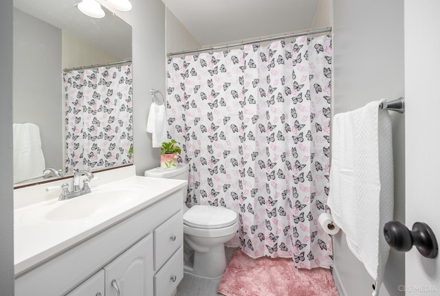 658 Cutter Ln, Elk Grove Village, IL 60007 - bathroom featuring toilet, vanity, and curtained shower
