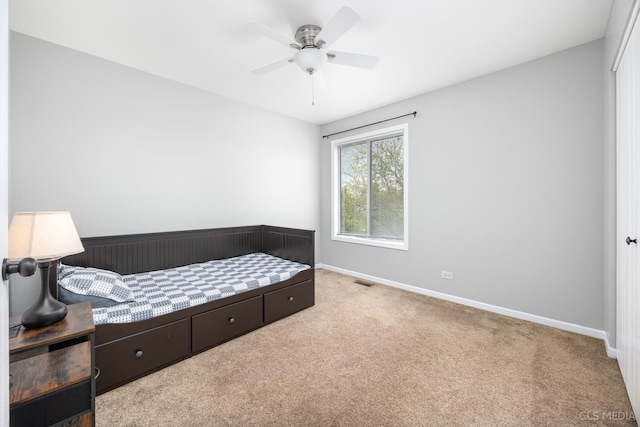 658 Cutter Ln, Elk Grove Village, IL 60007 - carpeted bedroom with baseboards and a ceiling fan