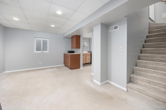 658 Cutter Ln, Elk Grove Village, IL 60007 - finished below grade area featuring light colored carpet, baseboards, recessed lighting, a paneled ceiling, and stairs