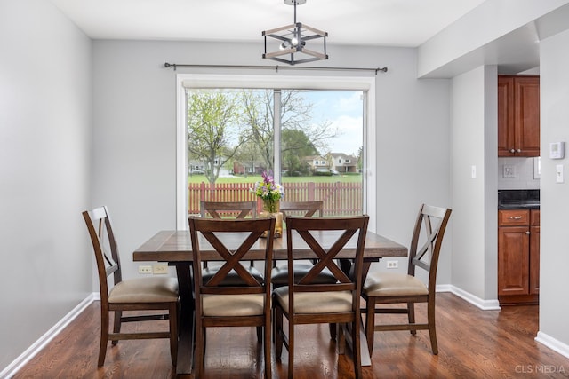 658 Cutter Ln, Elk Grove Village, IL 60007 - dining area with dark wood-style floors and baseboards