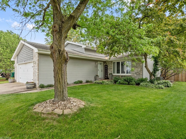 1150 Jerald Dr, Joliet, IL 60431 - view of front facade featuring an attached garage, driveway, and central AC