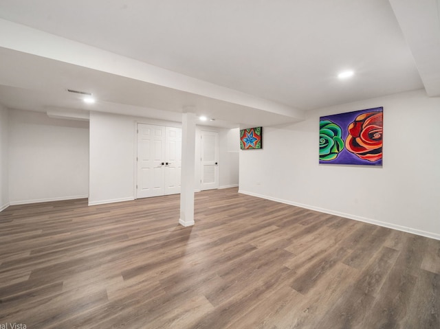 1150 Jerald Dr, Joliet, IL 60431 - finished basement with baseboards, wood finished floors, and recessed lighting
