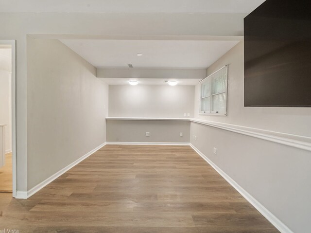 1150 Jerald Dr, Joliet, IL 60431 - below grade area featuring wood finished floors and baseboards
