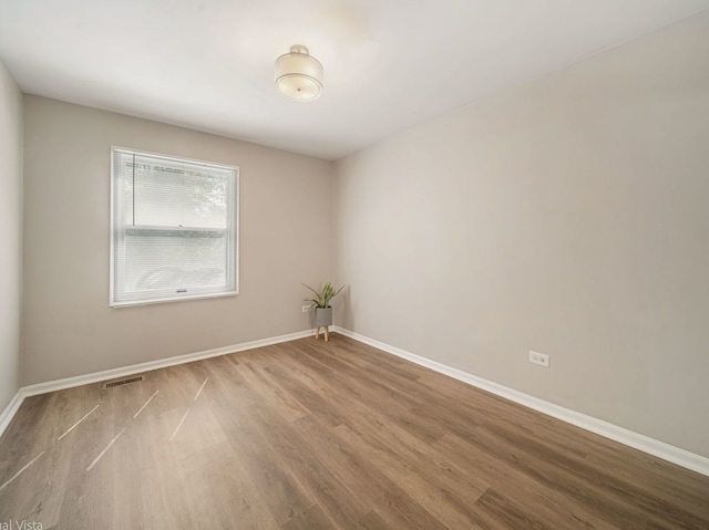 1150 Jerald Dr, Joliet, IL 60431 - empty room featuring wood finished floors and baseboards