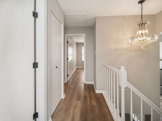 1150 Jerald Dr, Joliet, IL 60431 - hall featuring an upstairs landing, wood finished floors, baseboards, and a chandelier
